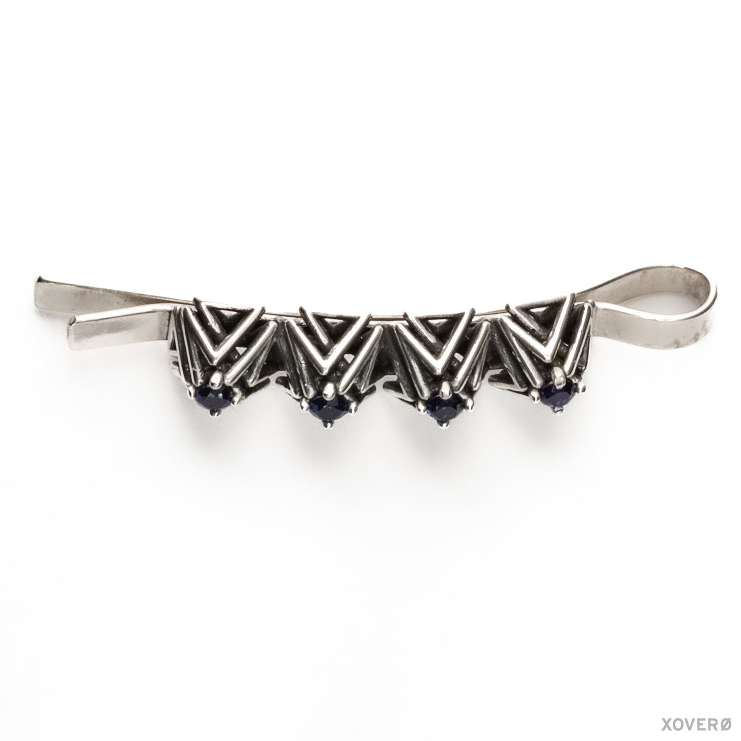 Art Deco-inspired heirloom bobby pin composed of an angular lattice of pyramid studs set with blue sapphires.