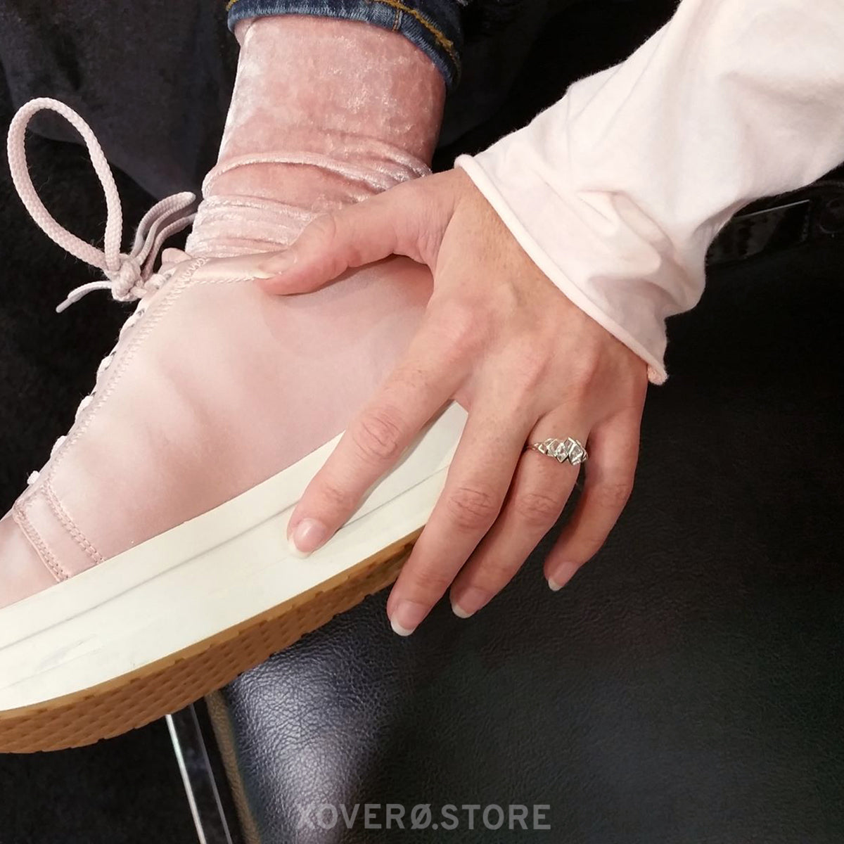 Sterling silver futuristic lattice ring with Art Deco inspired profile worn with a casual outfit.