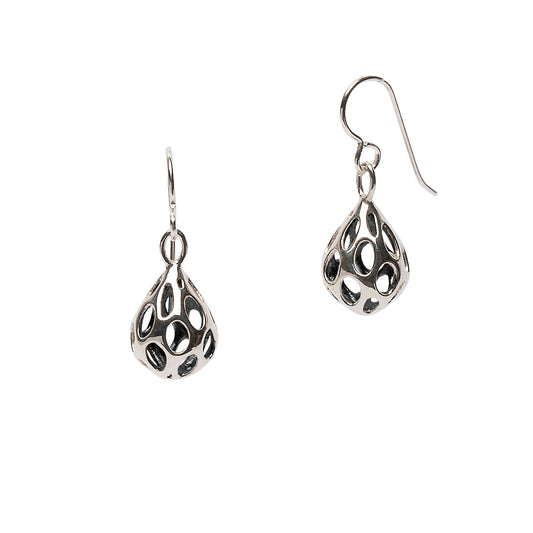 Xover0’s OLEA earrings in polished sterling silver feature droplet-shaped forms pierced with elongated oval cutouts, shown front and side.