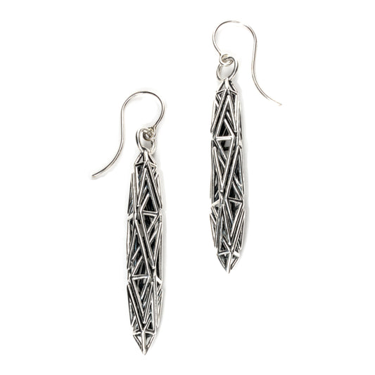 Sculptural solid sterling silver dangle earrings with angular prismatic latticework, crafted for lovers of architectural, edgy artisan jewelry.