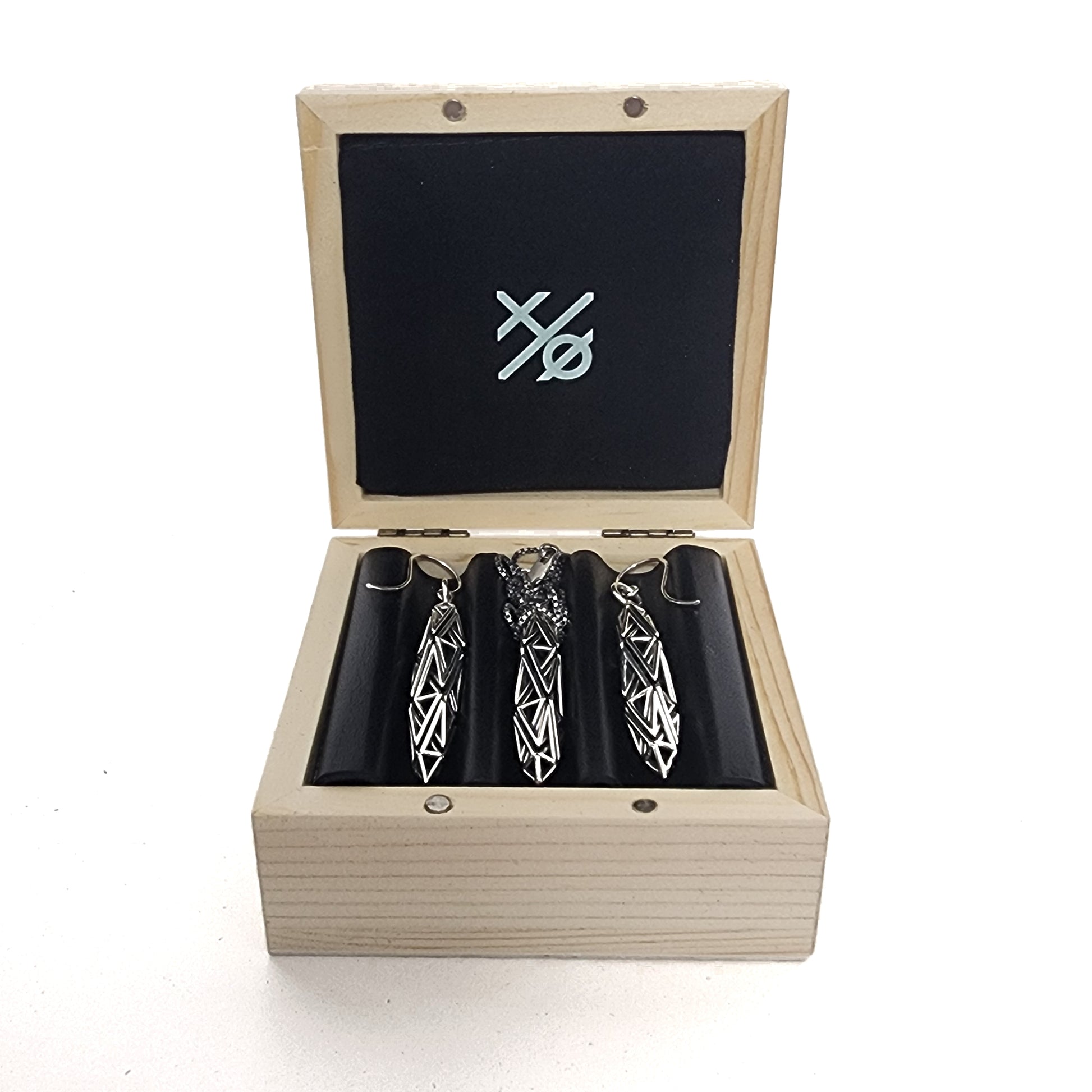 Solid .925 sterling silver pendant and earring set with architectural latticework, in a wood gift box with custom leather insert and velvet pouch.