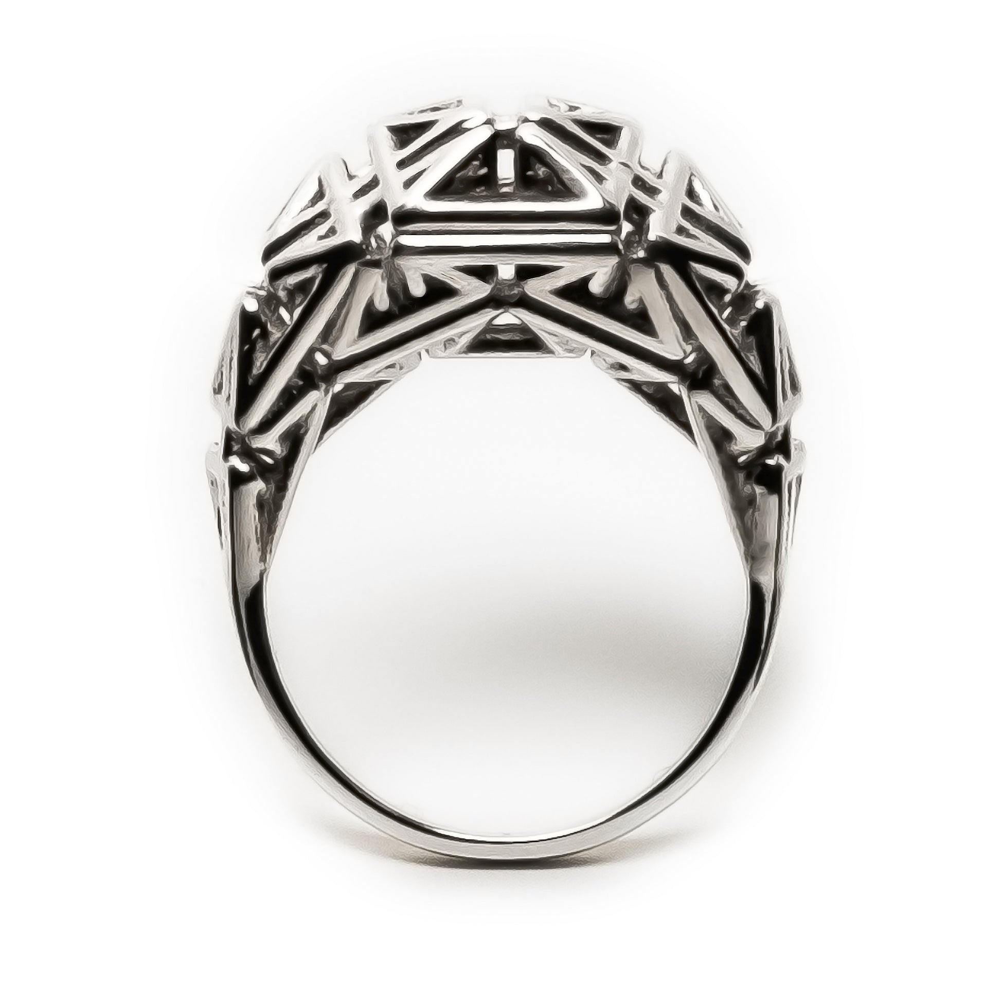 Sculptural unisex ring in solid .925 sterling silver with oxidized recesses and angular architectural latticework in a signet-like form.