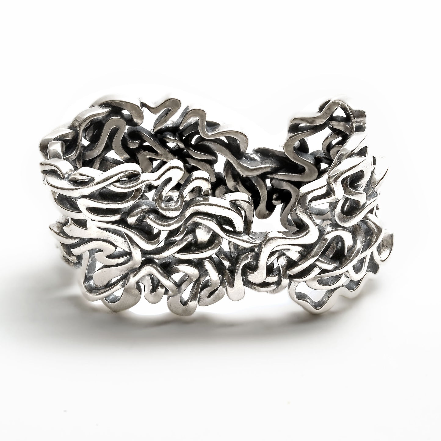 Seven ancient courses of the Mississippi River are woven together in this solid sterling silver heirloom napkin ring. 