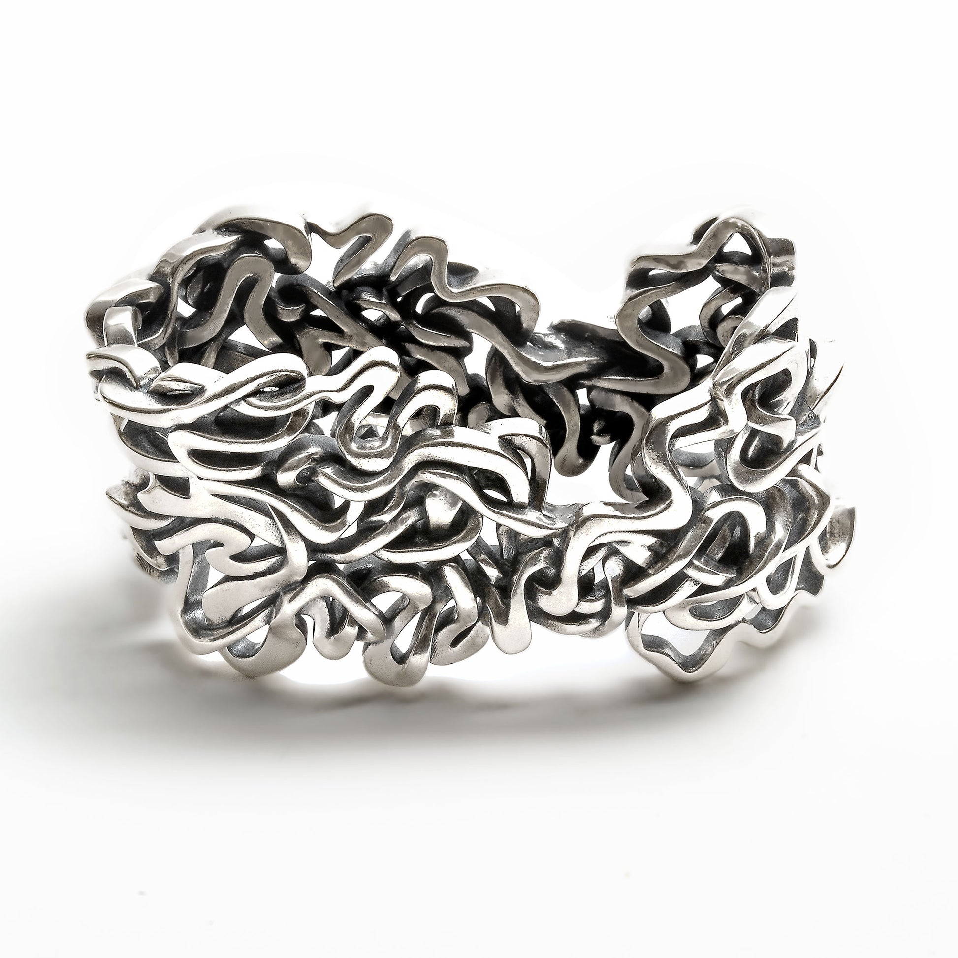 Seven ancient courses of the Mississippi River are woven together in this solid sterling silver heirloom napkin ring. 