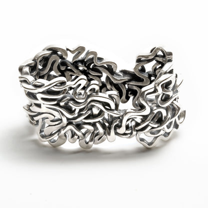 Seven ancient courses of the Mississippi River are woven together in this solid sterling silver heirloom napkin ring. 