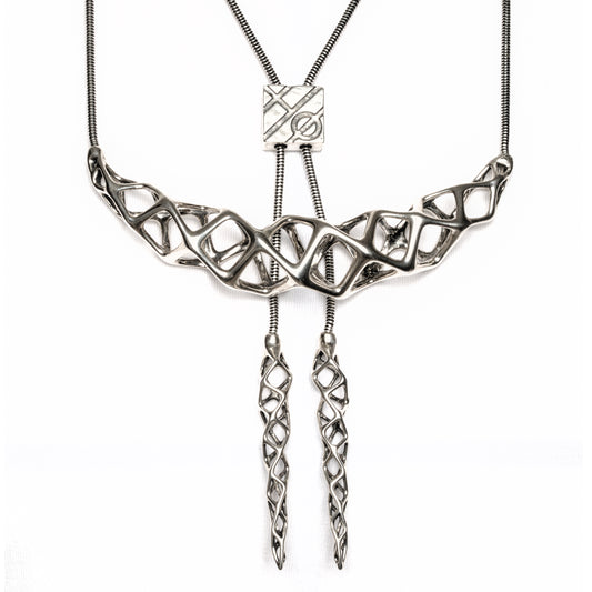This solid sterling silver necklace is an original Xover0 jewelry concept. It is a hybrid between a bolo tie and a choker. Hence the name boker. 