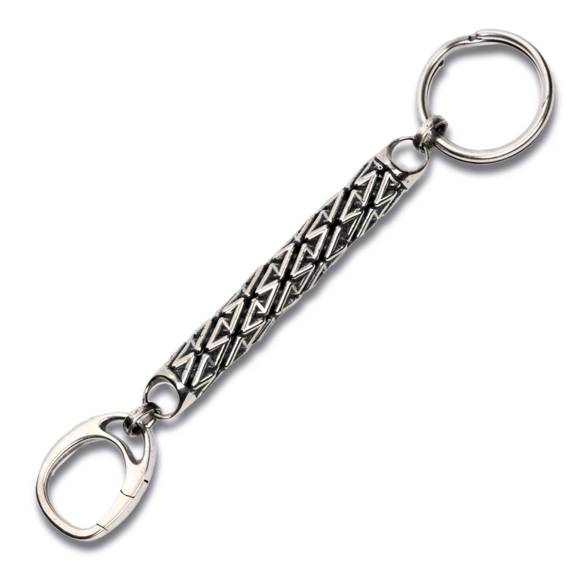 Sterling silver designer keychain with precise architectural detailed latticework featuring a spiral ring at one end and spring loaded clasp at the other for valet convenience. 