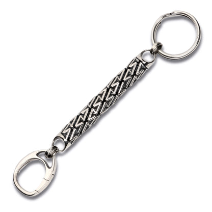 Sterling silver designer keychain with precise architectural detailed latticework featuring a spiral ring at one end and spring loaded clasp at the other for valet convenience. 