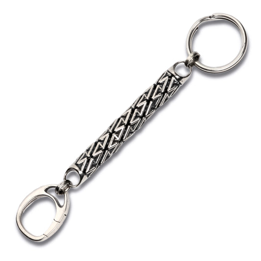 Sterling silver designer keychain with precise architectural detailed latticework featuring a spiral ring at one end and spring loaded clasp at the other for valet convenience. 