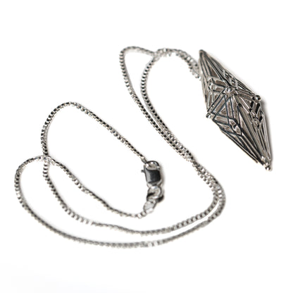 Sterling silver lattice pendant with angular Art Deco inspired geometry on an 18 inch box chain secured with a lobster clasp. 