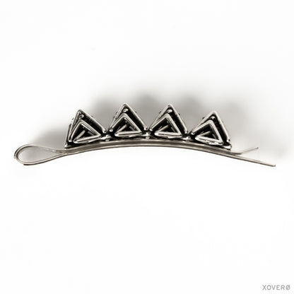 Side view of hand-soldered solid sterling silver heirloom bobby pin with four dimensional protruding latticework spikes. 