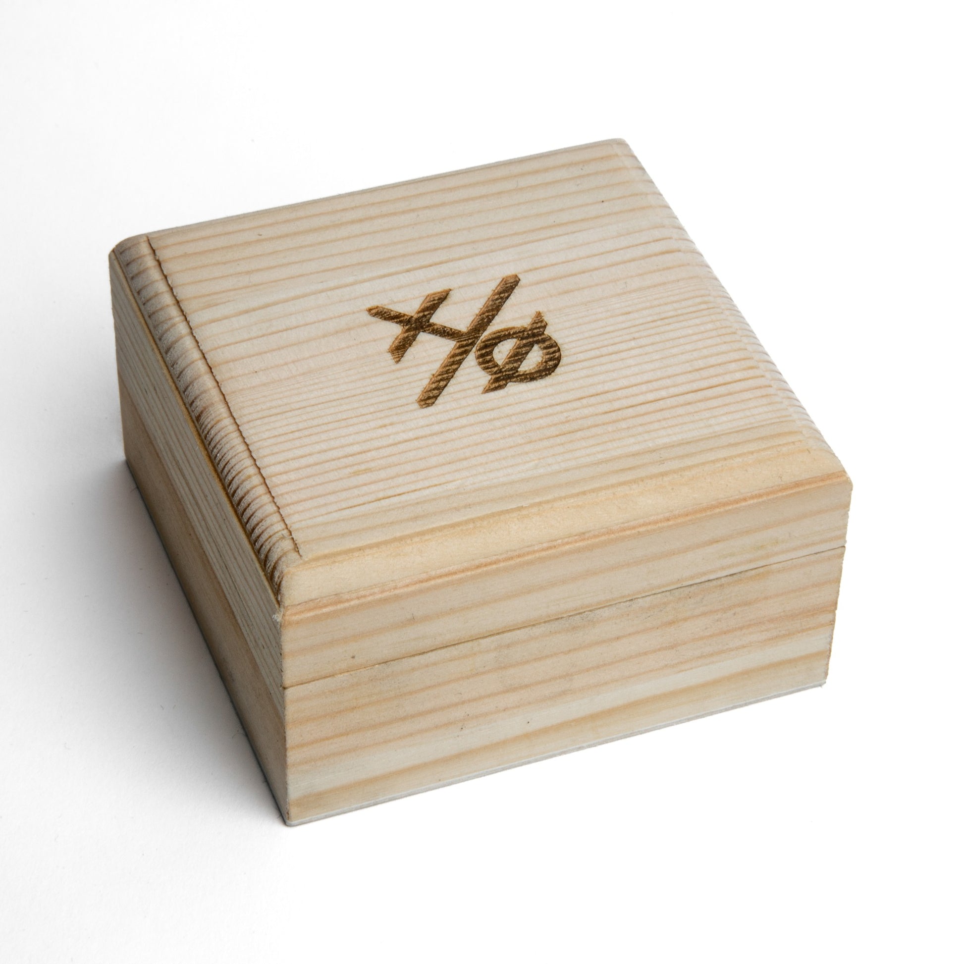 Wooden box with Xover0 trademark on a white background
