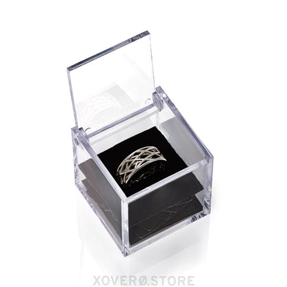 Futuristic solid sterling silver sculptural lattice ring presented in a clear box with custom laser cut neoprene insert. 