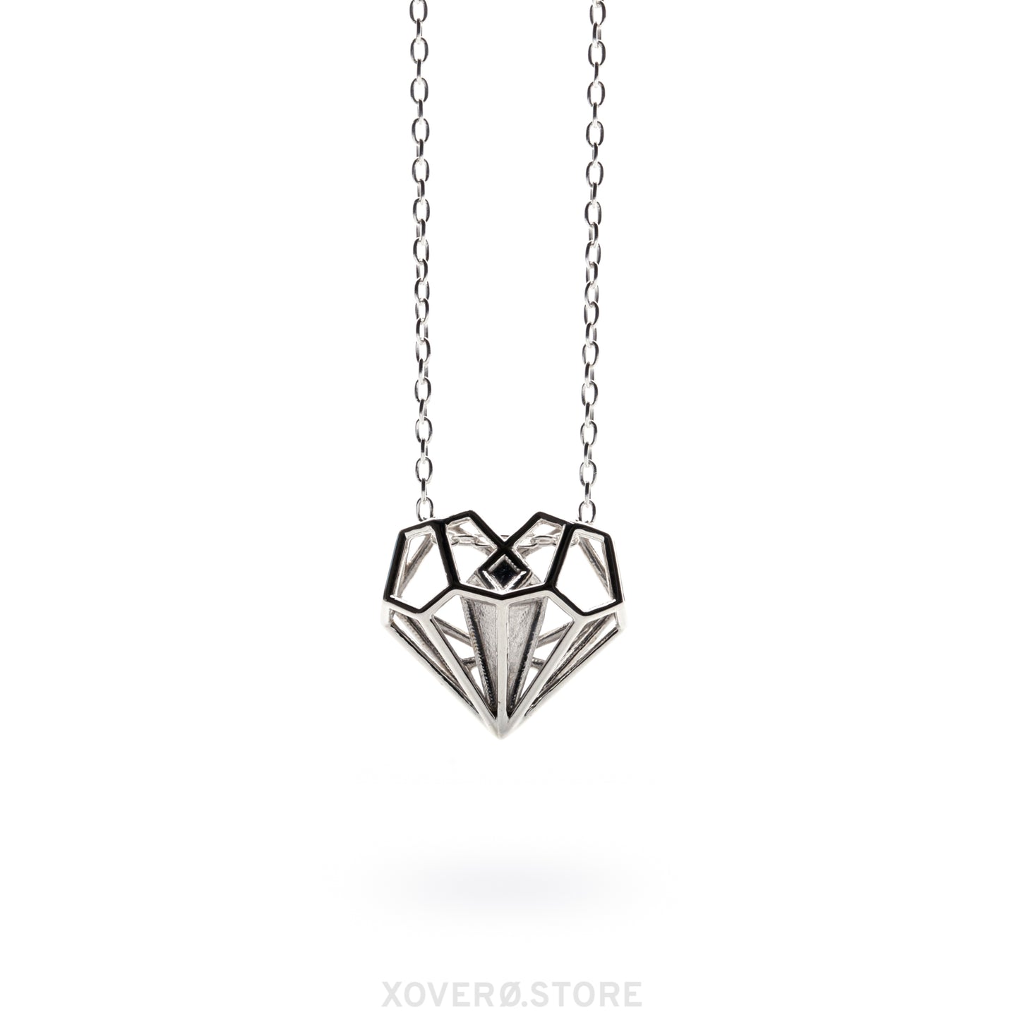 The Geoheart Pendant necklace from the Netflix movie Uglies, worn by Joey King as Tally Youngblood. This solid .925 sterling silver heart pendant, designed by Xover0 Jewelry, takes a futuristic approach to Art Deco architecture. The iconic, heirloom-quality design is prominently featured as part of the storyline in Uglies.